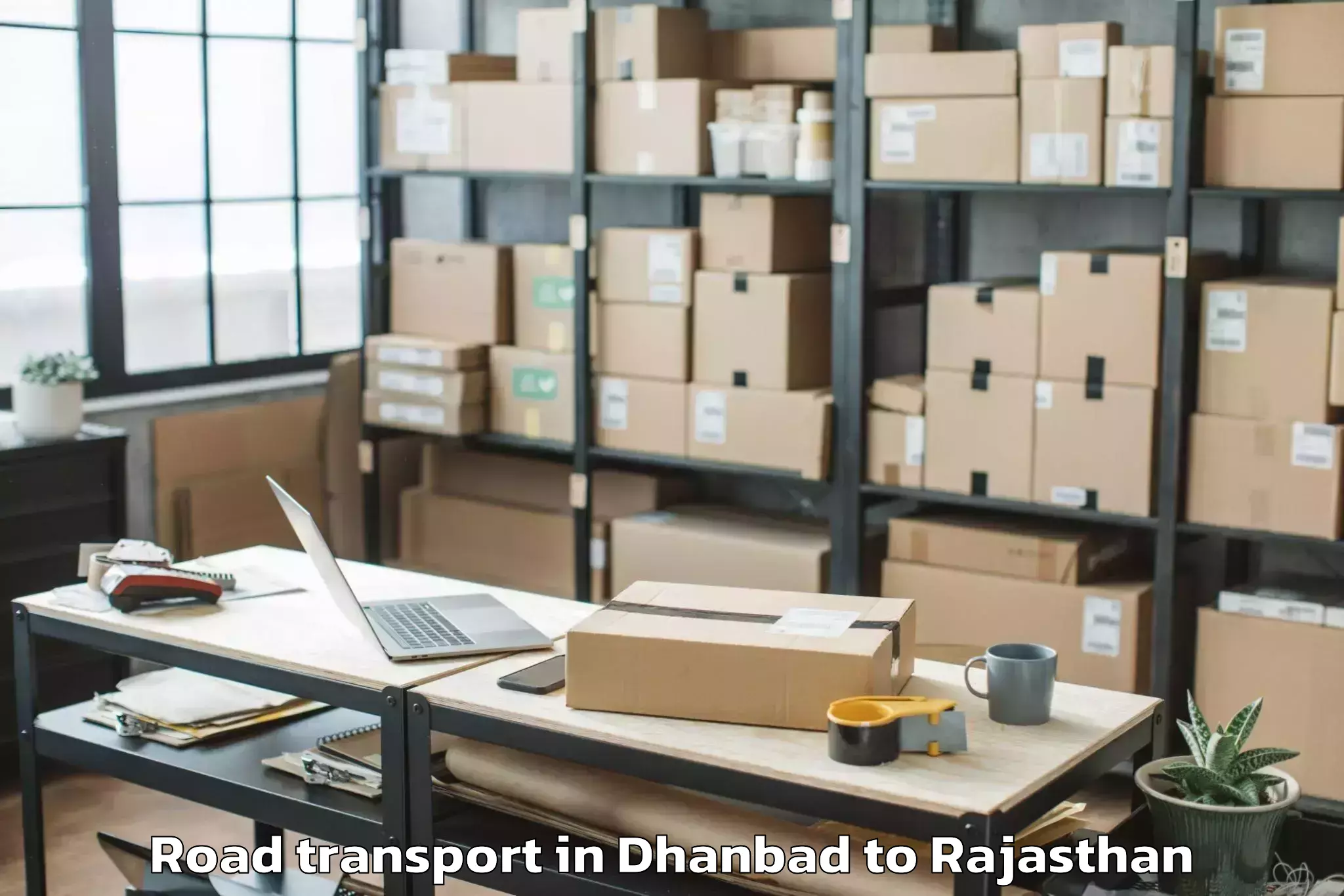 Easy Dhanbad to Madanganj Kishangarh Road Transport Booking